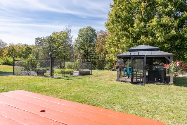 an aerial view of house with yard