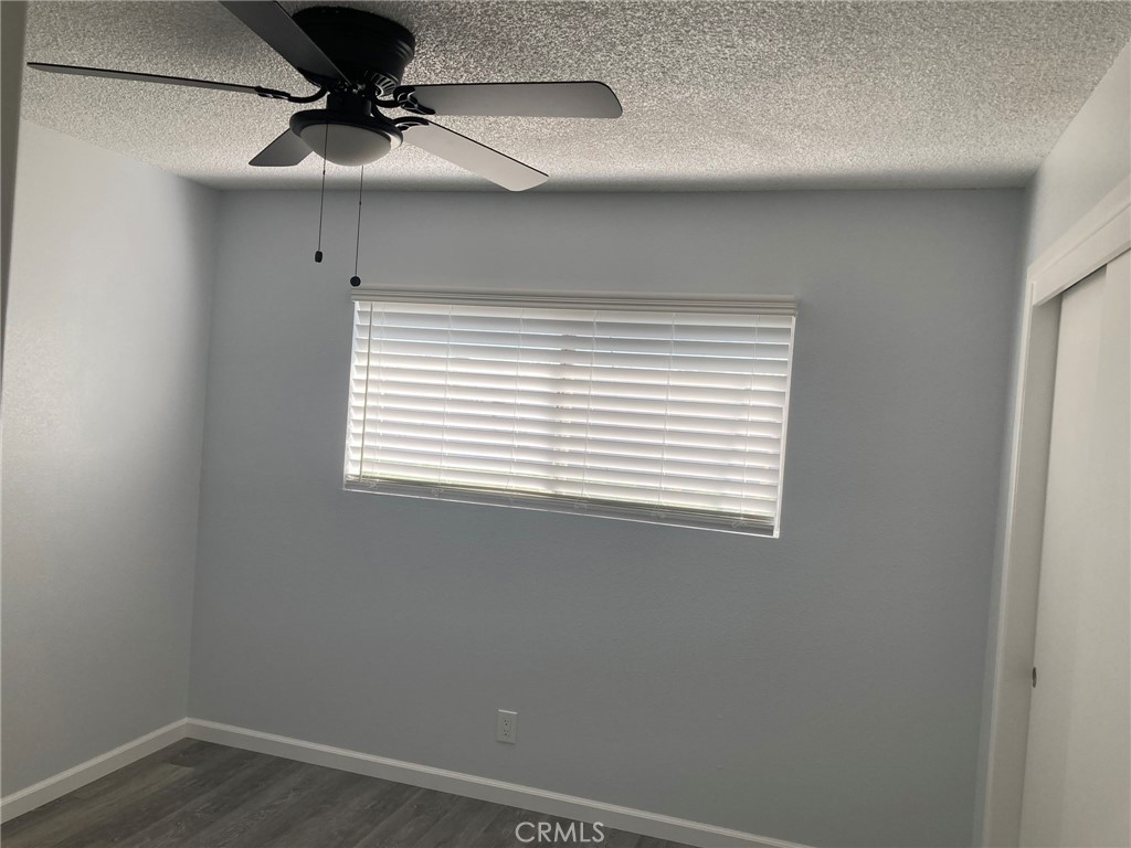 409 West Perdew Avenue Ridgecrest, CA 93555 - Photo 11 of 14 a view of a small space with a window