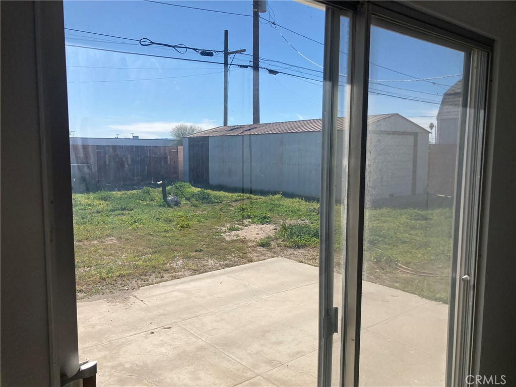 409 West Perdew Avenue Ridgecrest, CA 93555 - Photo 14 of 14 a view of a backyard of a house