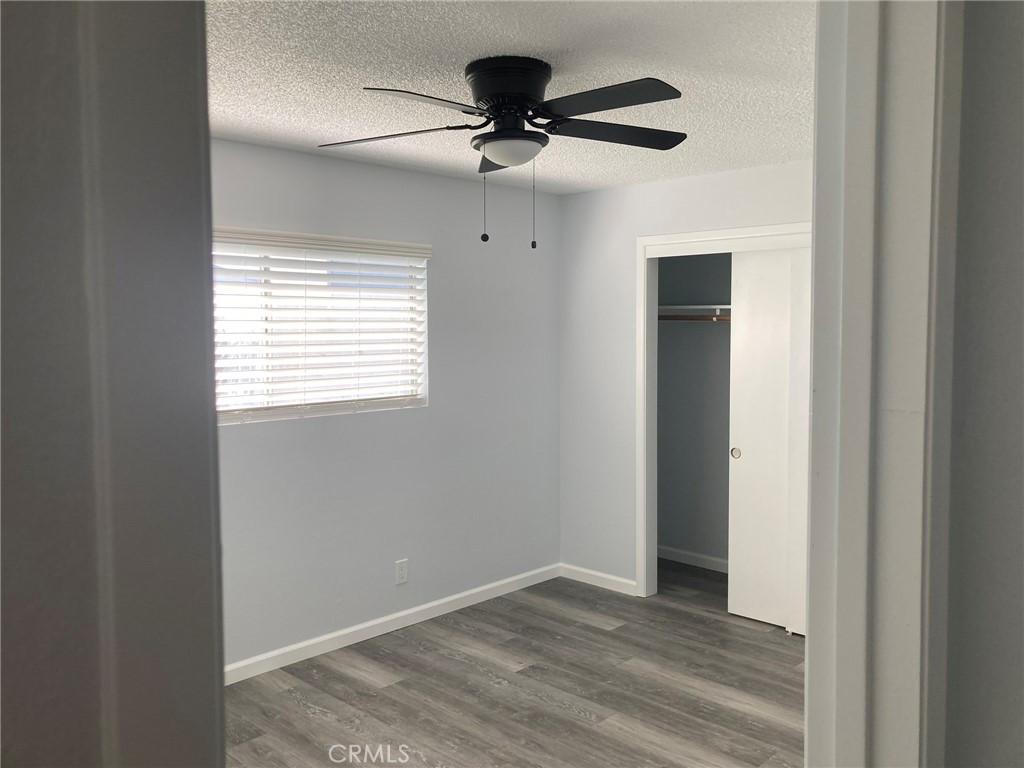 409 West Perdew Avenue Ridgecrest, CA 93555 - Photo 10 of 14 a view of an empty room with a window