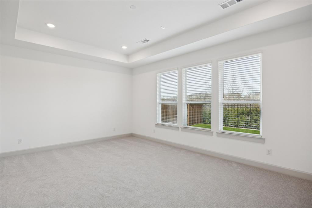 4180 Kestrel Street Prosper, TX 75078 - Photo 11 of 23 an empty room with a window