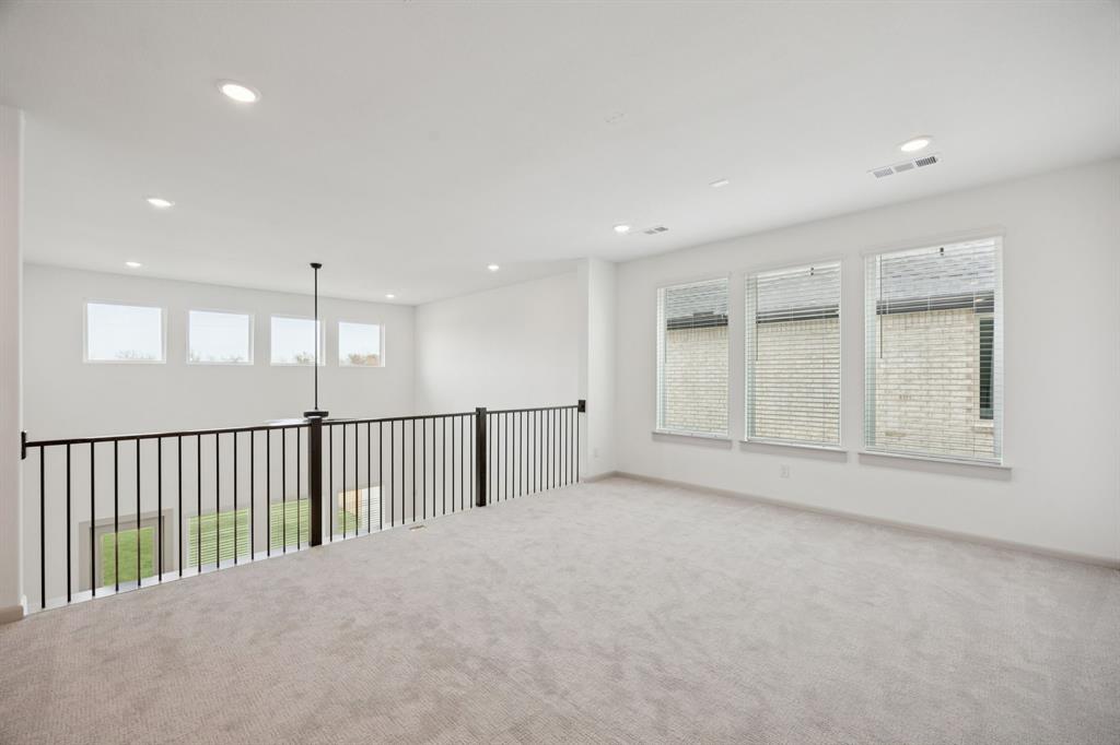4180 Kestrel Street Prosper, TX 75078 - Photo 14 of 23 a view of an empty room