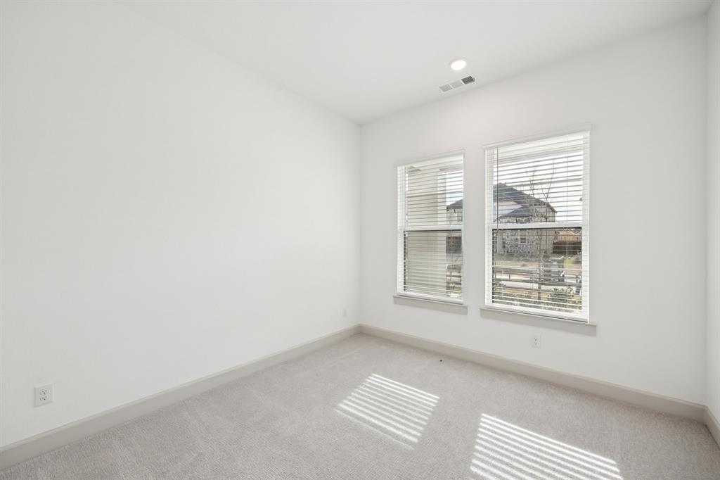 4180 Kestrel Street Prosper, TX 75078 - Photo 23 of 23 a view of an empty room with a window