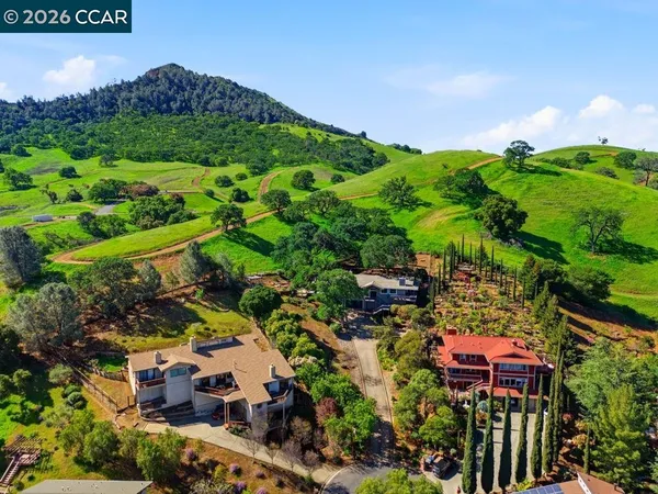 a view of a city with mountains in the background