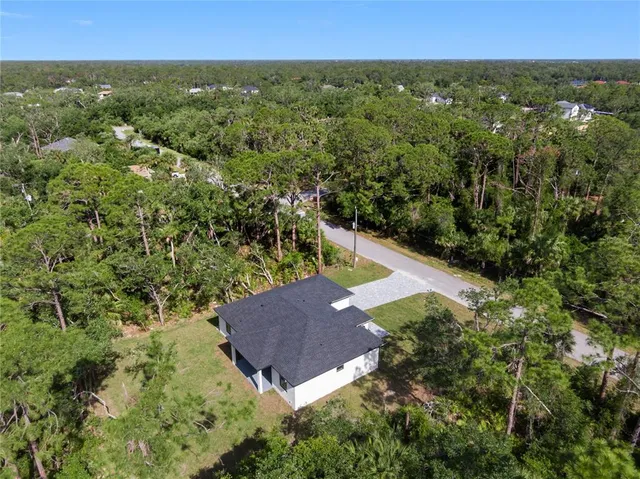 a view of storage and utility room with racks on the wall