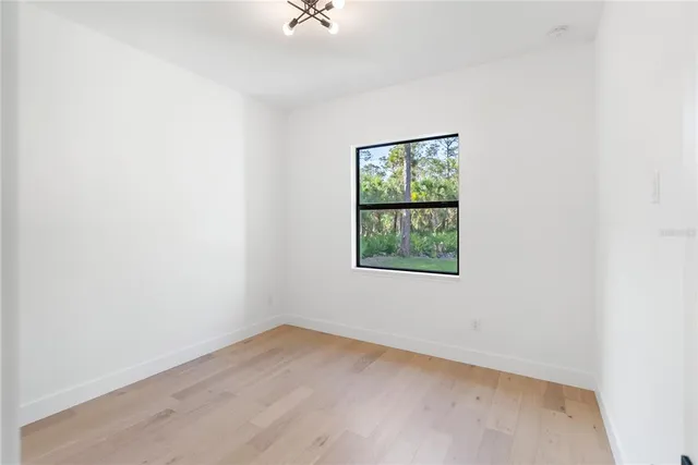 a bathroom with a toilet tub and view