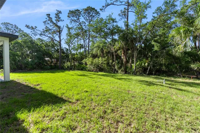 a kitchen with a sink and a window