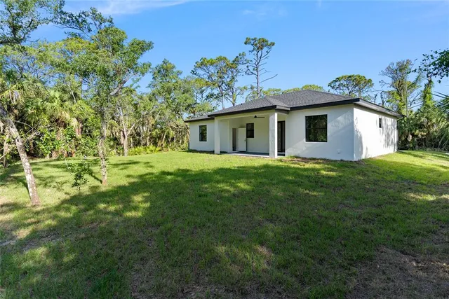 a stove top oven sitting inside of a kitchen