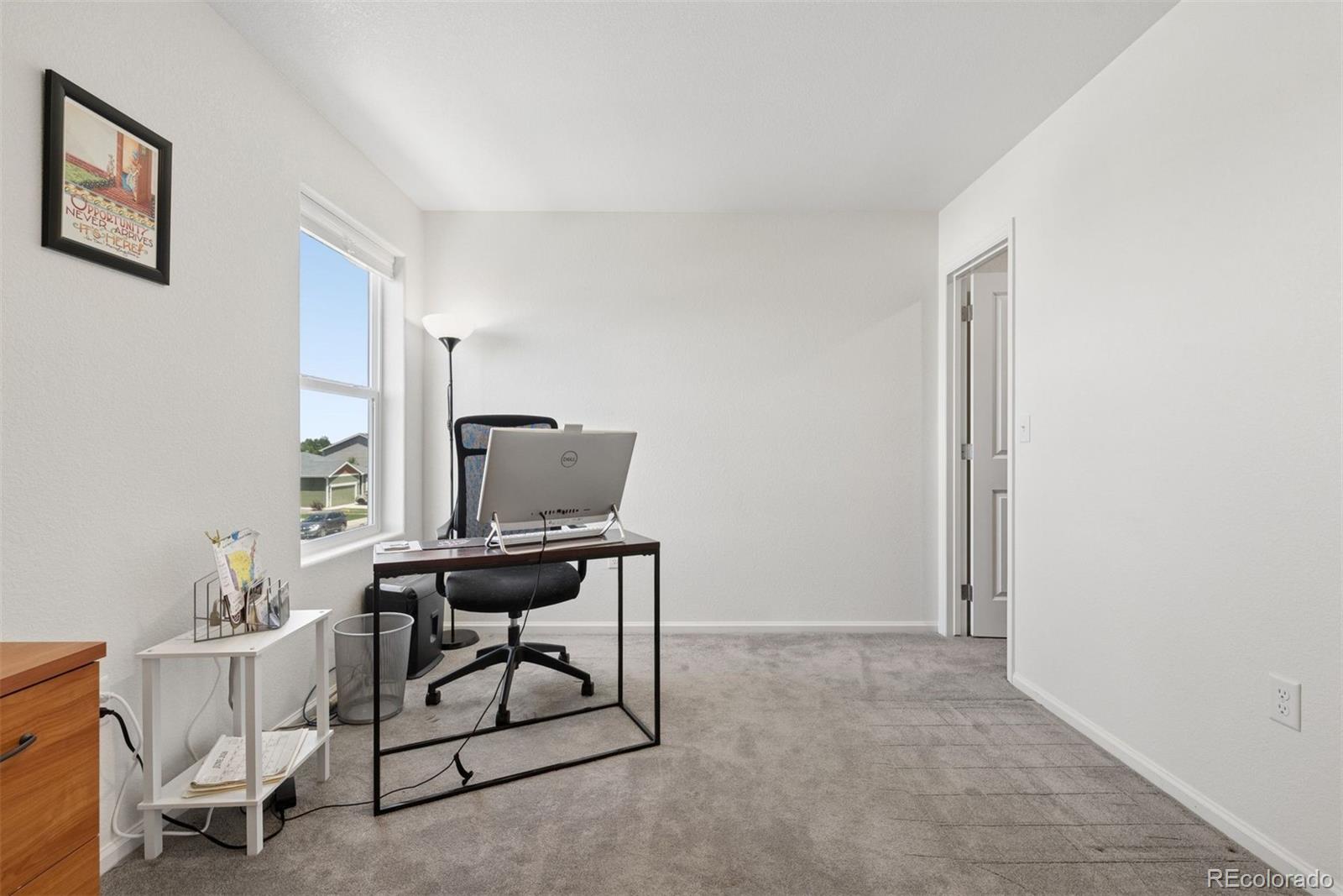 7307 Animas Avenue Frederick, CO 80530 - Photo 33 of 49 a view of a workspace with furniture