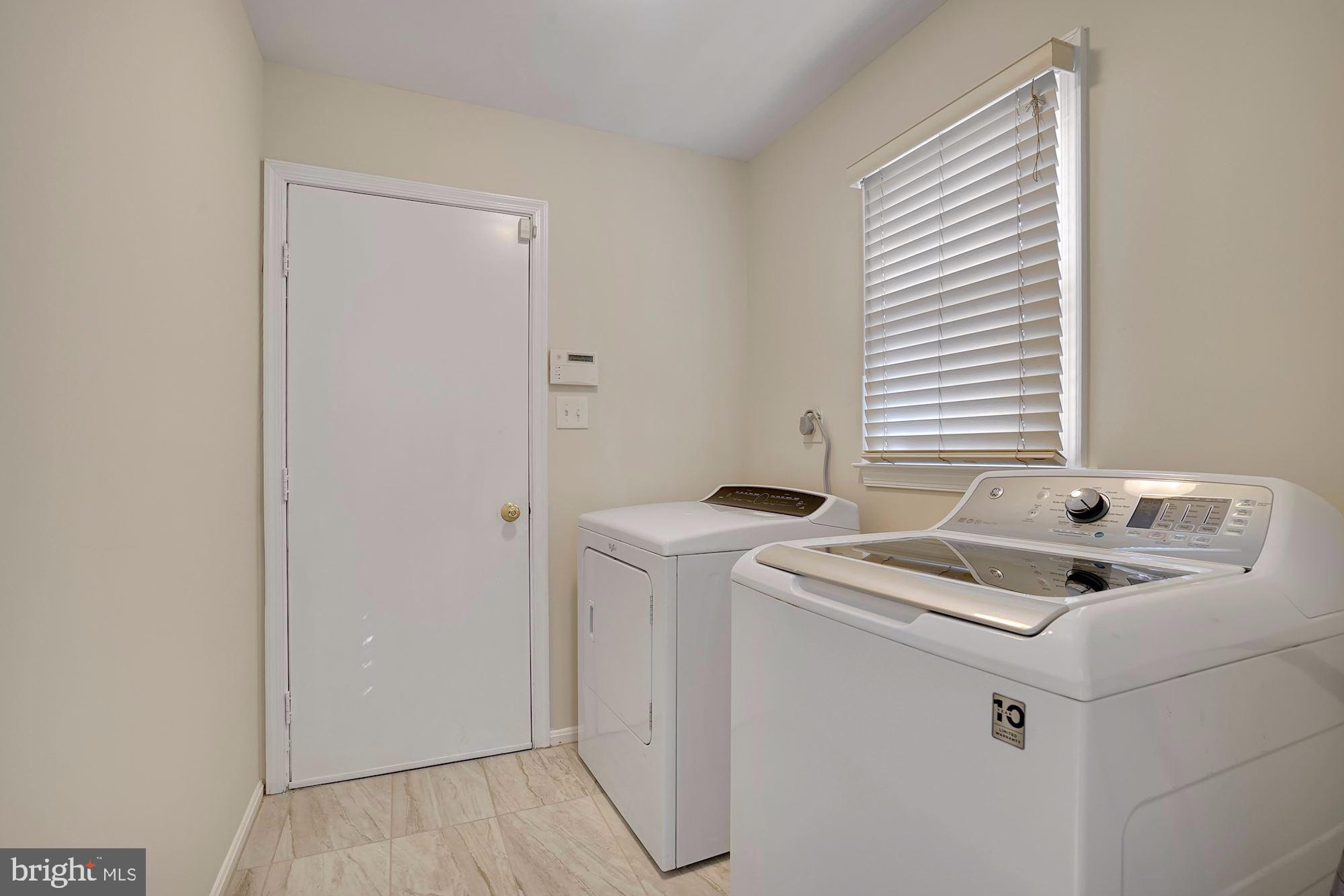 2317 Holly Spring Drive Silver Spring, MD 20905 - Photo 25 of 58 Laundry/Mud Room-Off Kitchen passthru 2-Car Garage
