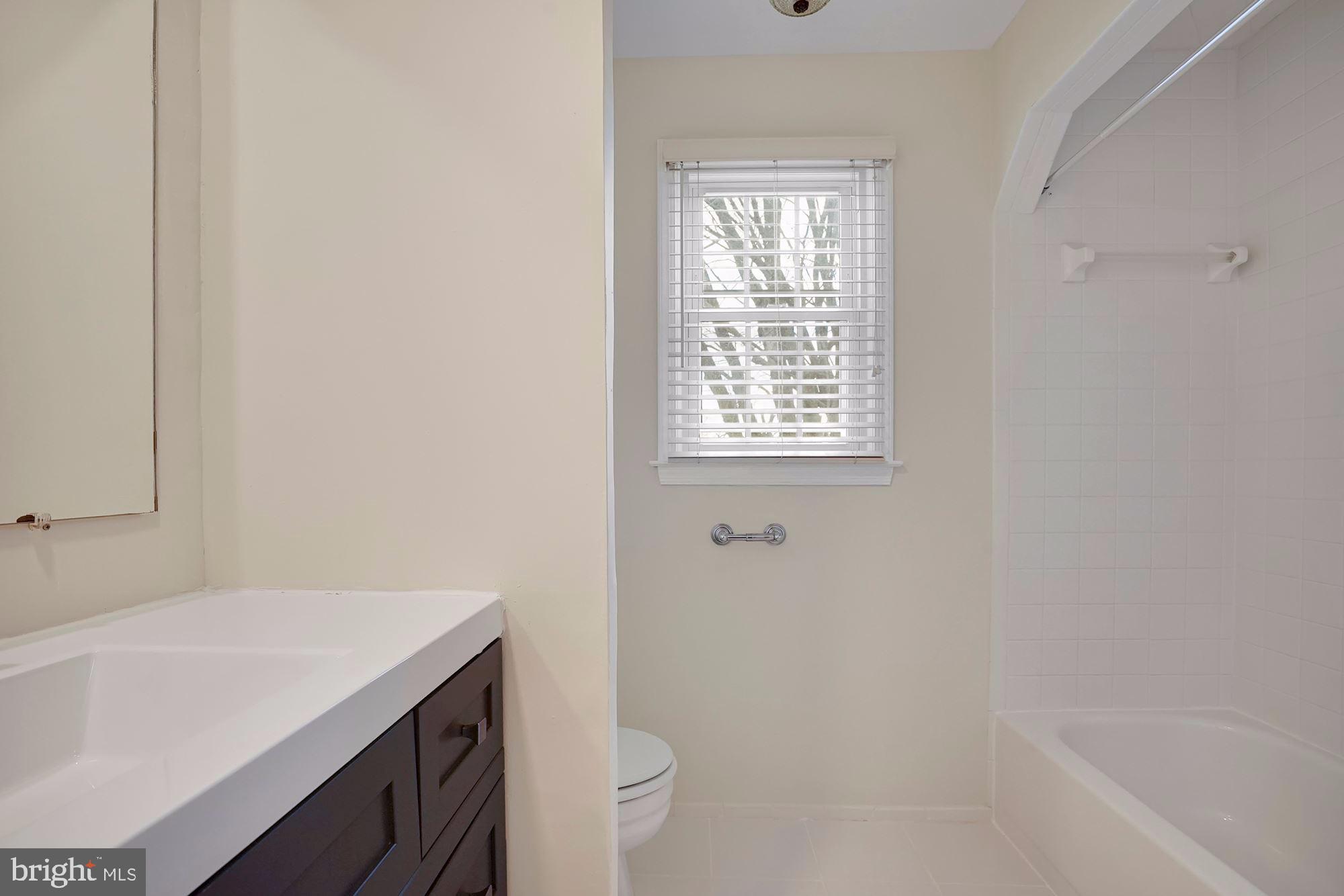 2317 Holly Spring Drive Silver Spring, MD 20905 - Photo 39 of 58 2nd Level Full Bathroom, New Vanity, New Paint