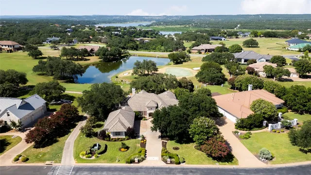 an aerial view of residential house with outdoor space