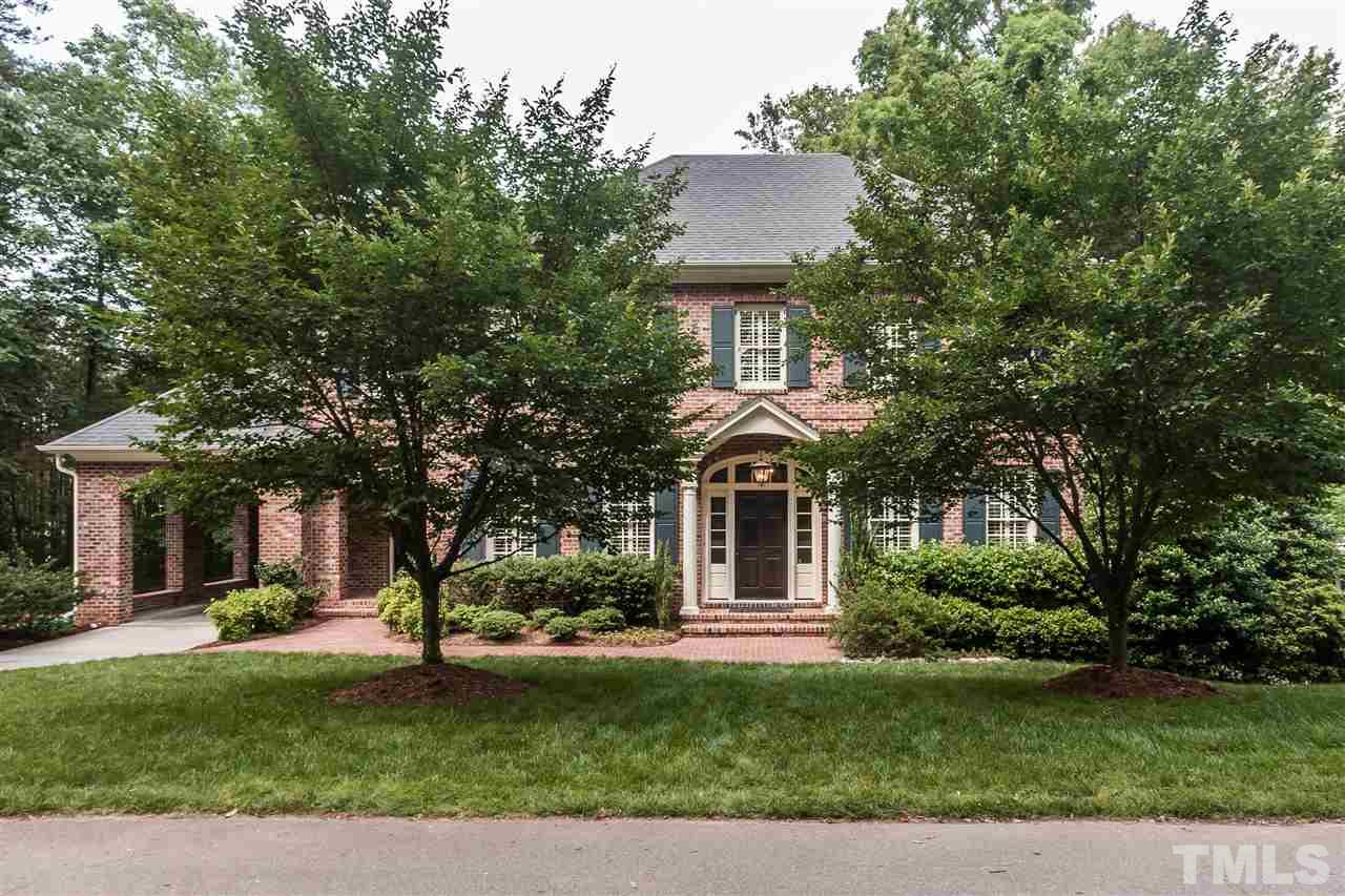 607 Runnymede Road Raleigh, NC 27607 - Photo 1 of 25 a front view of a house with a garden