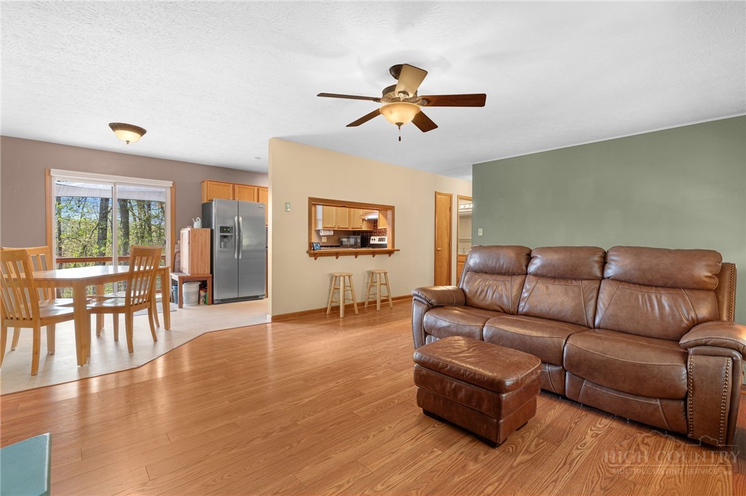 190 Kings Road Boone, NC 28607 - Photo 10 of 15 a living room with furniture and a wooden floor