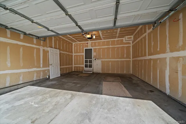 a view of an empty room with racks on the wall