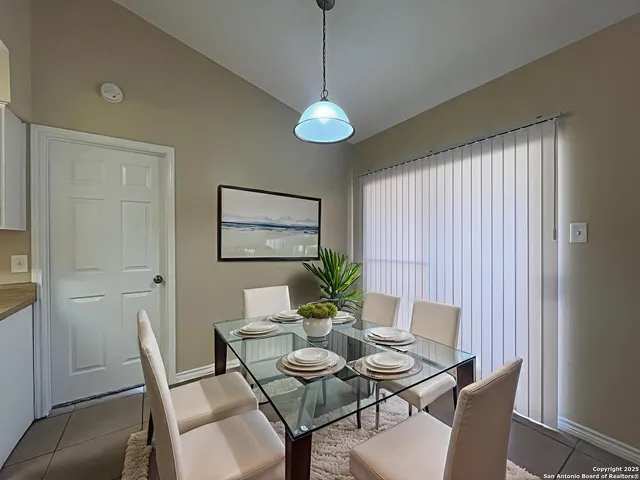 a view of a dining room with furniture
