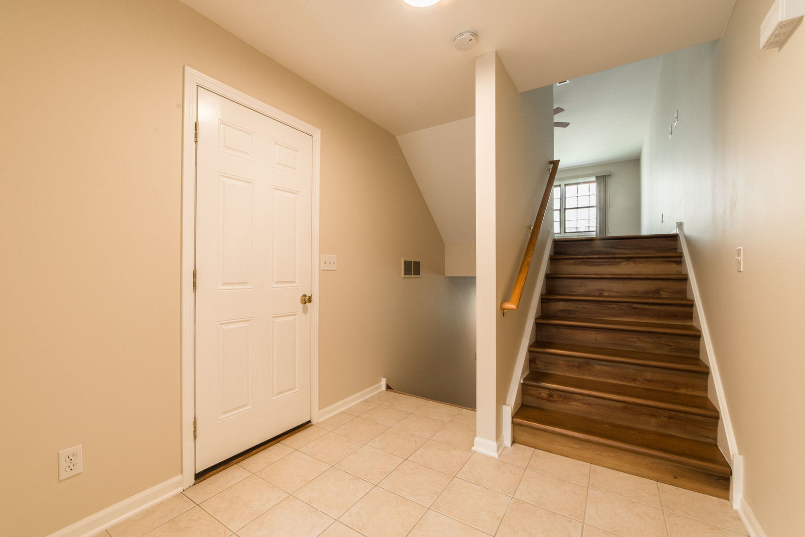 630 South Peace Road Sycamore, IL 60178 - Photo 3 of 21 a view of a hallway with entryway and white walls