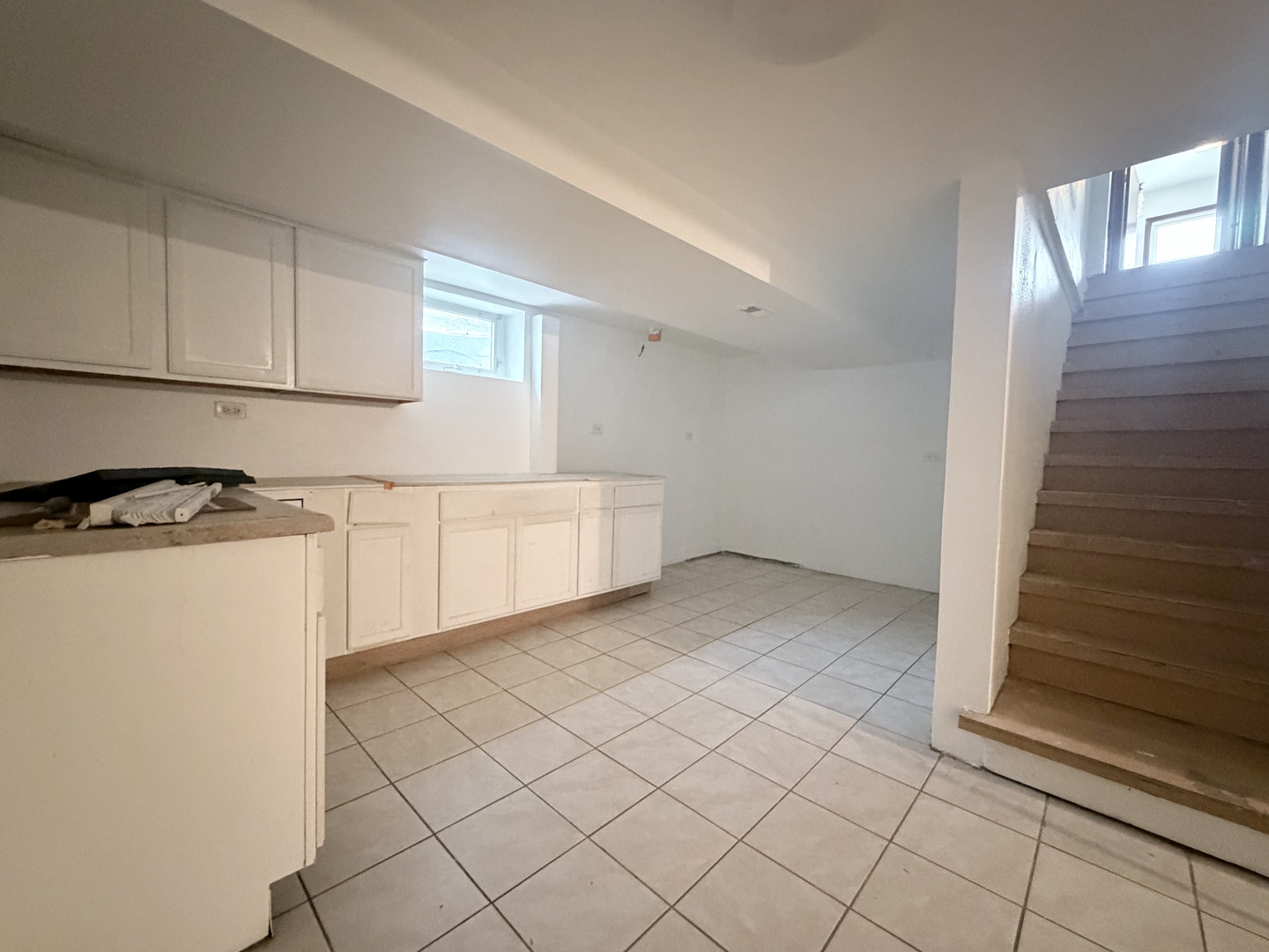 128 North York Road Bensenville, IL 60106 - Photo 21 of 39 a view of a kitchen with white cabinets