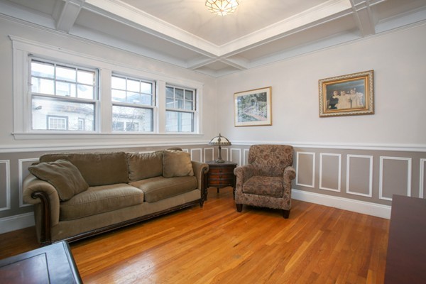70 Abbottsford Road, Unit 2 Brookline, MA 02446 - Photo 4 of 13 a living room with furniture and a large window