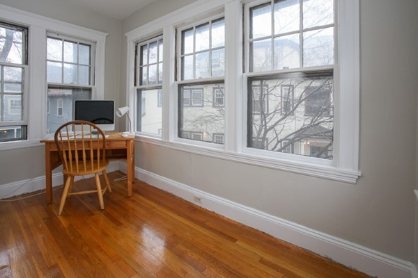 70 Abbottsford Road, Unit 2 Brookline, MA 02446 - Photo 5 of 13 a dining room with furniture and windows