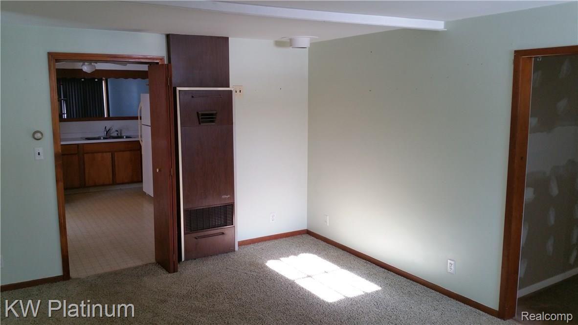 3116 Vincent Road North Street, MI 48049 - Photo 17 of 29 OTHER LIVING ROOM VIEW(THEY HAVE NEVER USED THE WALL FURNACE)