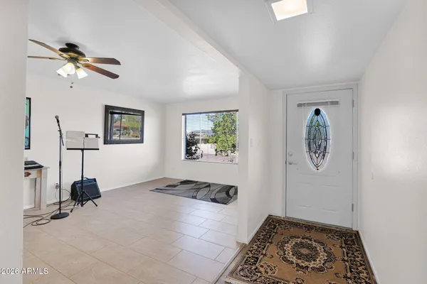 a view of workspace with furniture and windows