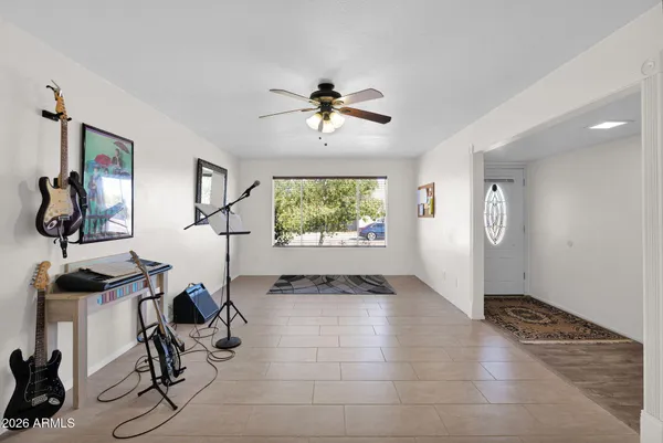 a living room with furniture and a window