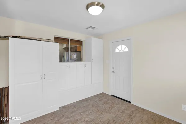 a view of a livingroom with a workspace