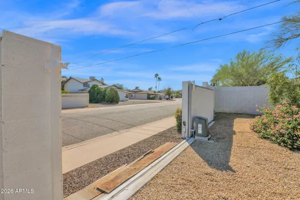 a view of a house with a street