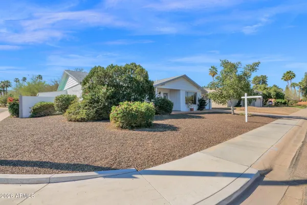 a view of a porch with seating space