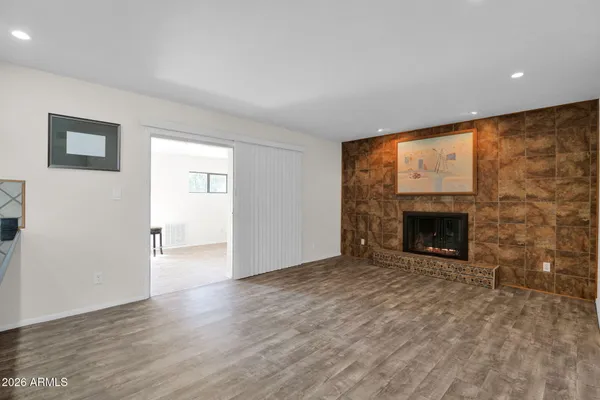 a kitchen with granite countertop a stove and a sink