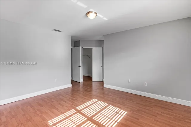 a view of a room with racks on the wall