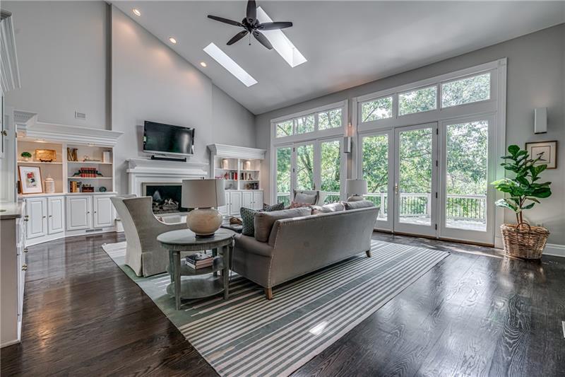 1460 Hollow Tree Drive Pittsburgh, PA 15241 - Photo 2 of 25 Two story family room with sky lights and French doors along the sides. Built in lit bookcases and wet bar.