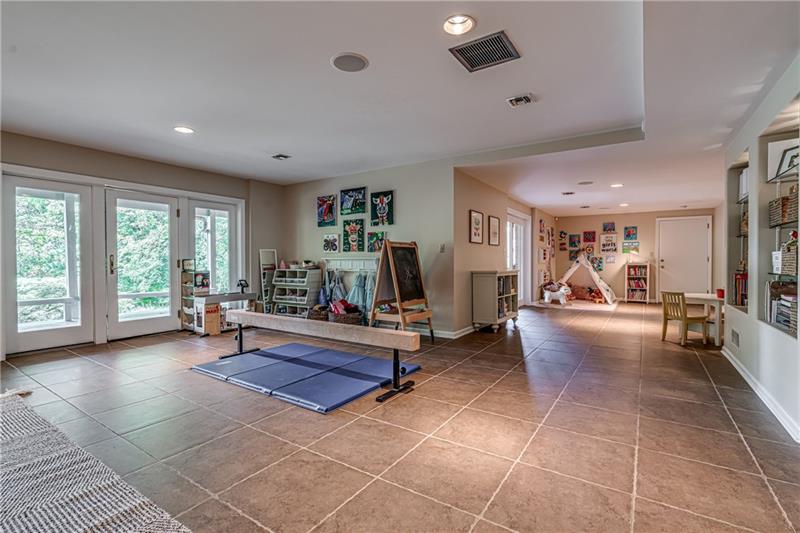 1460 Hollow Tree Drive Pittsburgh, PA 15241 - Photo 20 of 25 Large walkout basement with built in shelves.