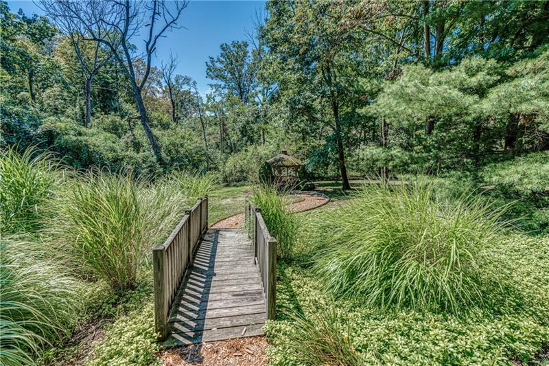 1460 Hollow Tree Drive Pittsburgh, PA 15241 - Photo 24 of 25 Parklike backyard with bridge and pathway leads to the gazebo.