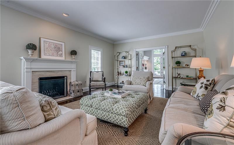 1460 Hollow Tree Drive Pittsburgh, PA 15241 - Photo 7 of 25 To the left of the front door is this lovely living room with fireplace and double doors opening to the family room.