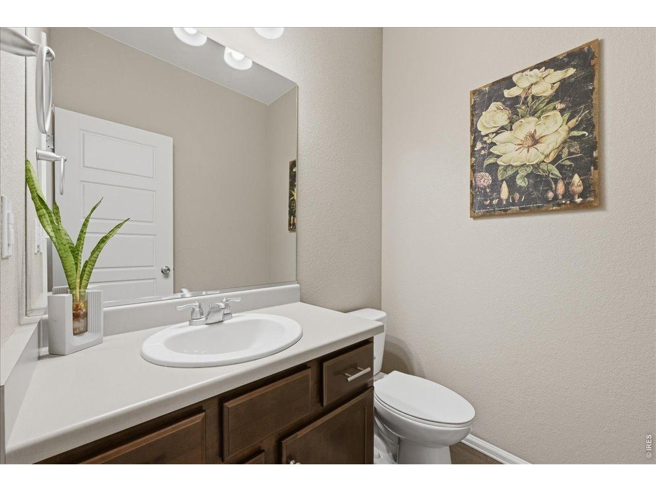 6096 Story Road Timnath, CO 80547 - Photo 32 of 50 a bathroom with a sink vanity and toilet