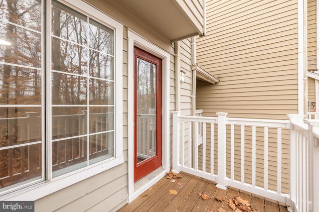 a view of a balcony with a door