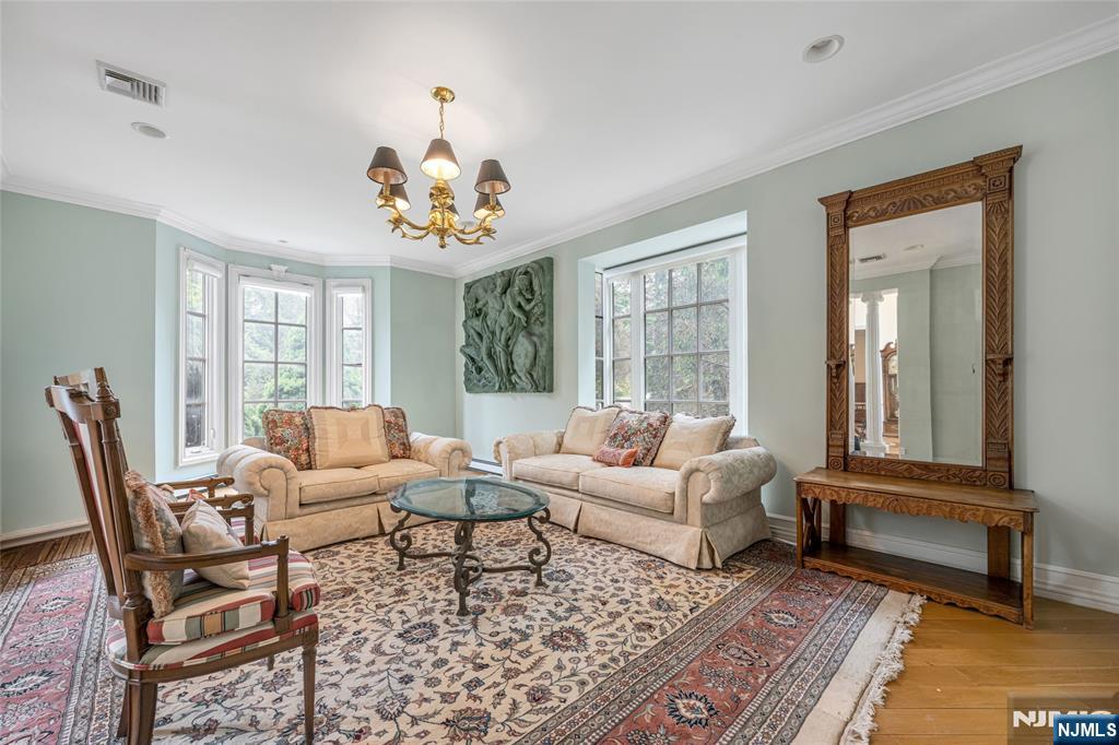 4 Hetzel Drive Mahwah, NJ 07430 - Photo 13 of 29 a living room with furniture and a window