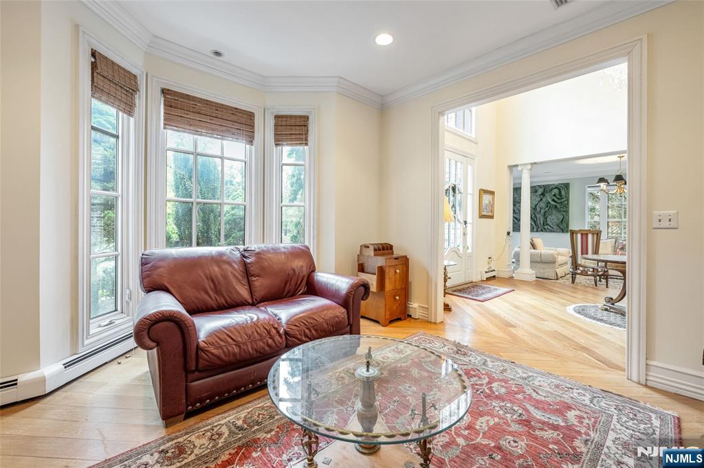 4 Hetzel Drive Mahwah, NJ 07430 - Photo 14 of 29 a living room with furniture and a large window
