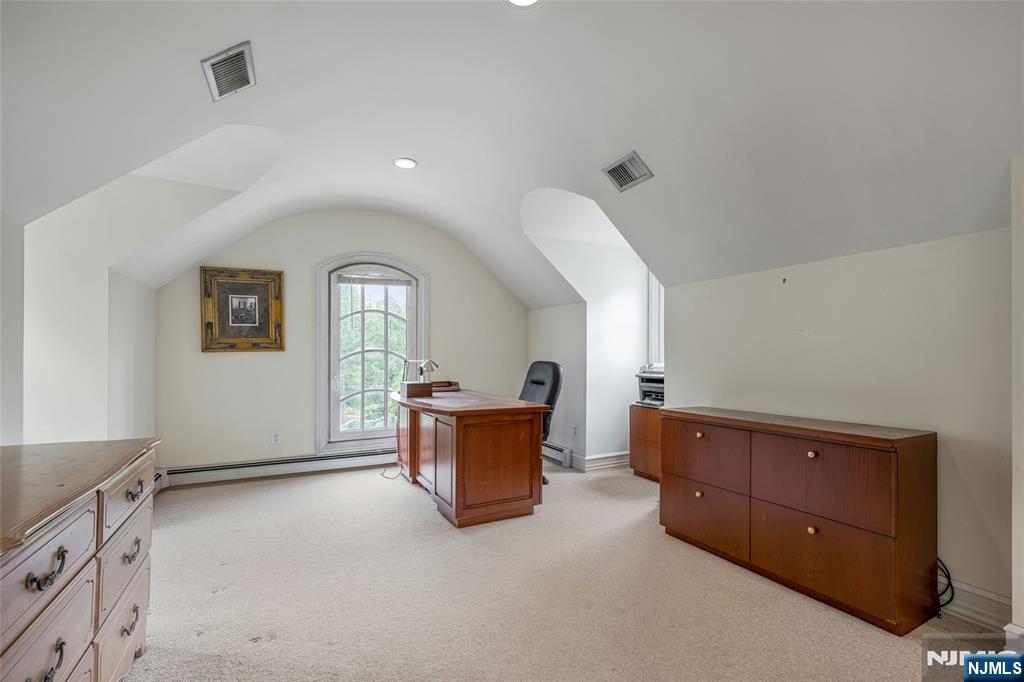 4 Hetzel Drive Mahwah, NJ 07430 - Photo 24 of 29 a view of a livingroom with furniture