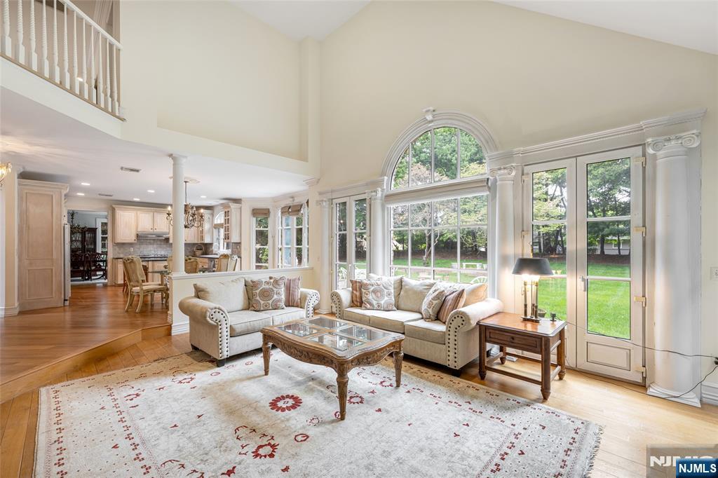 4 Hetzel Drive Mahwah, NJ 07430 - Photo 6 of 29 a living room with furniture and a large window