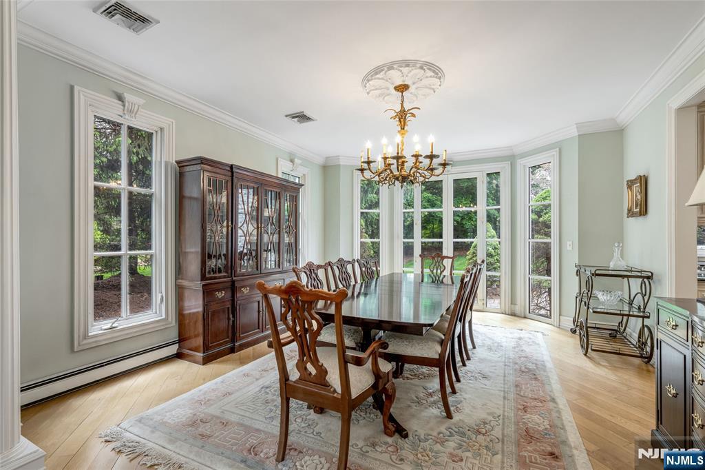 4 Hetzel Drive Mahwah, NJ 07430 - Photo 10 of 29 a view of a dining room with furniture window and wooden floor