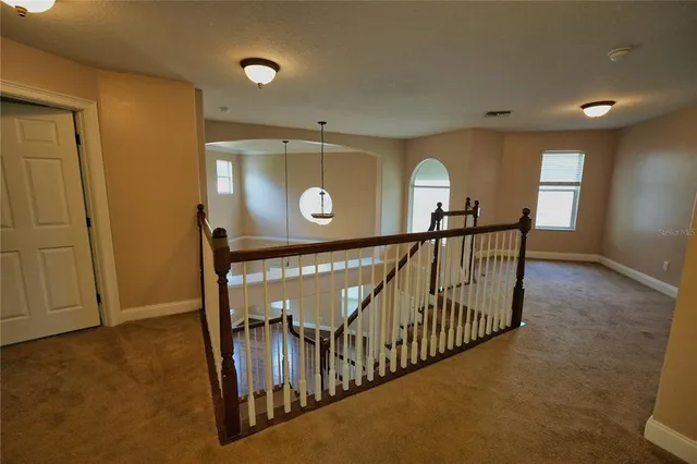 a bathroom with a sink a mirror and shower