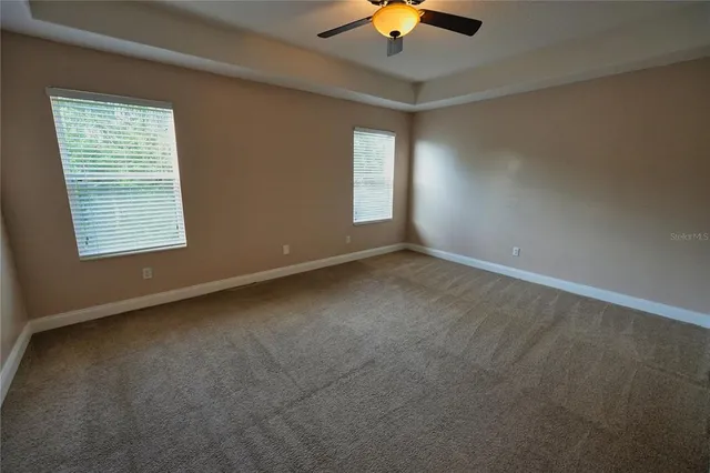 a kitchen with a stove a sink and a refrigerator