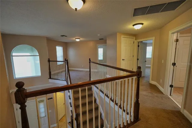 a bathroom with a toilet a sink and shower