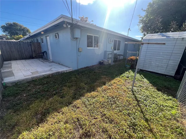 a view of kitchen and white appliances