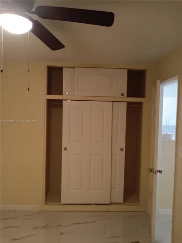 a view of small space with racks on the wall