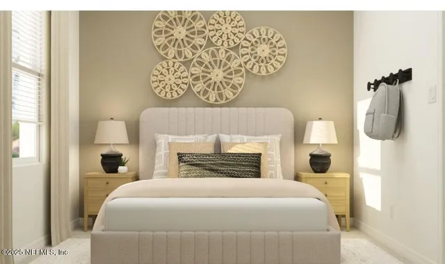 a bedroom with a bed and a window