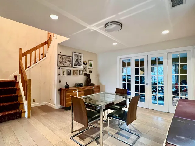 a workspace with furniture and stairs